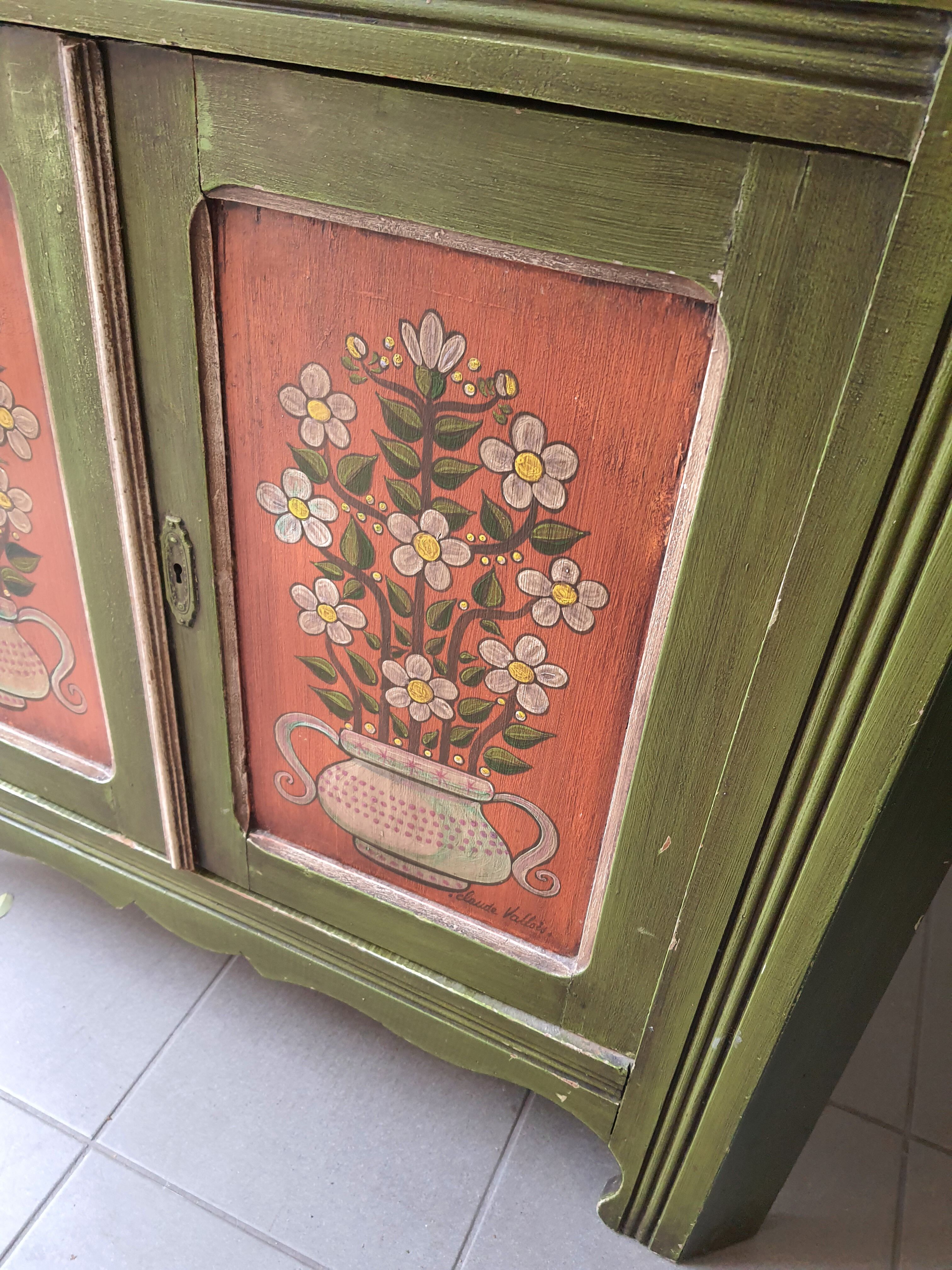 Hand-painted and signed notched cabinet