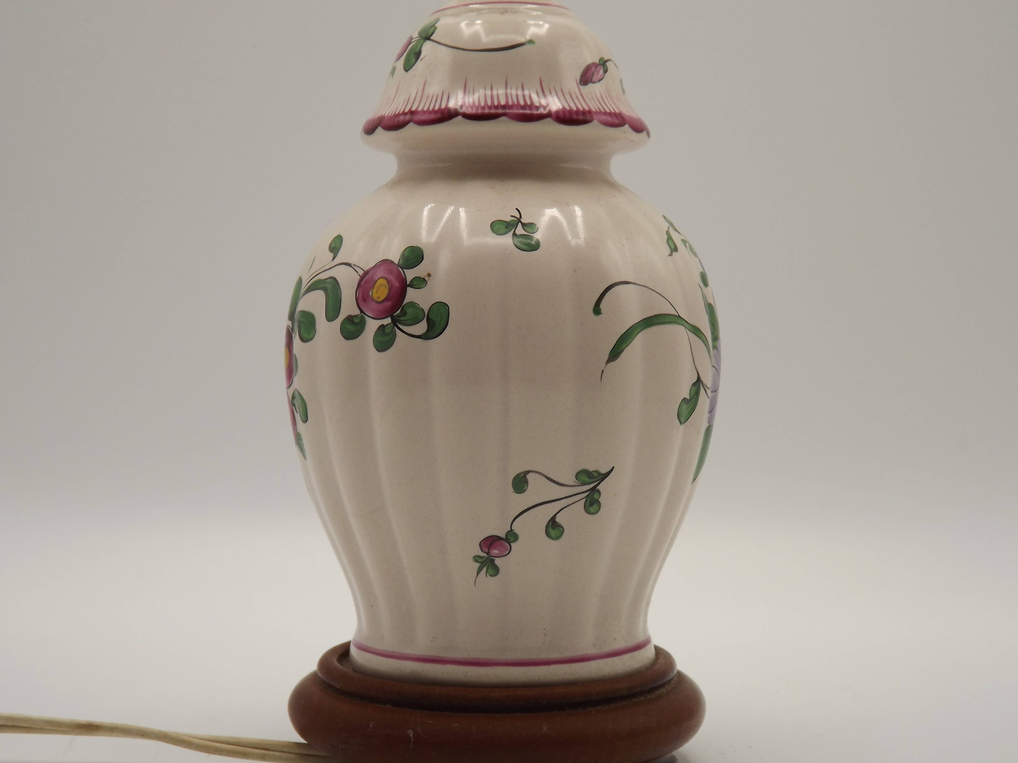 Pretty French vintage hand-painted ceramic floral lamp base on wooden plinth.