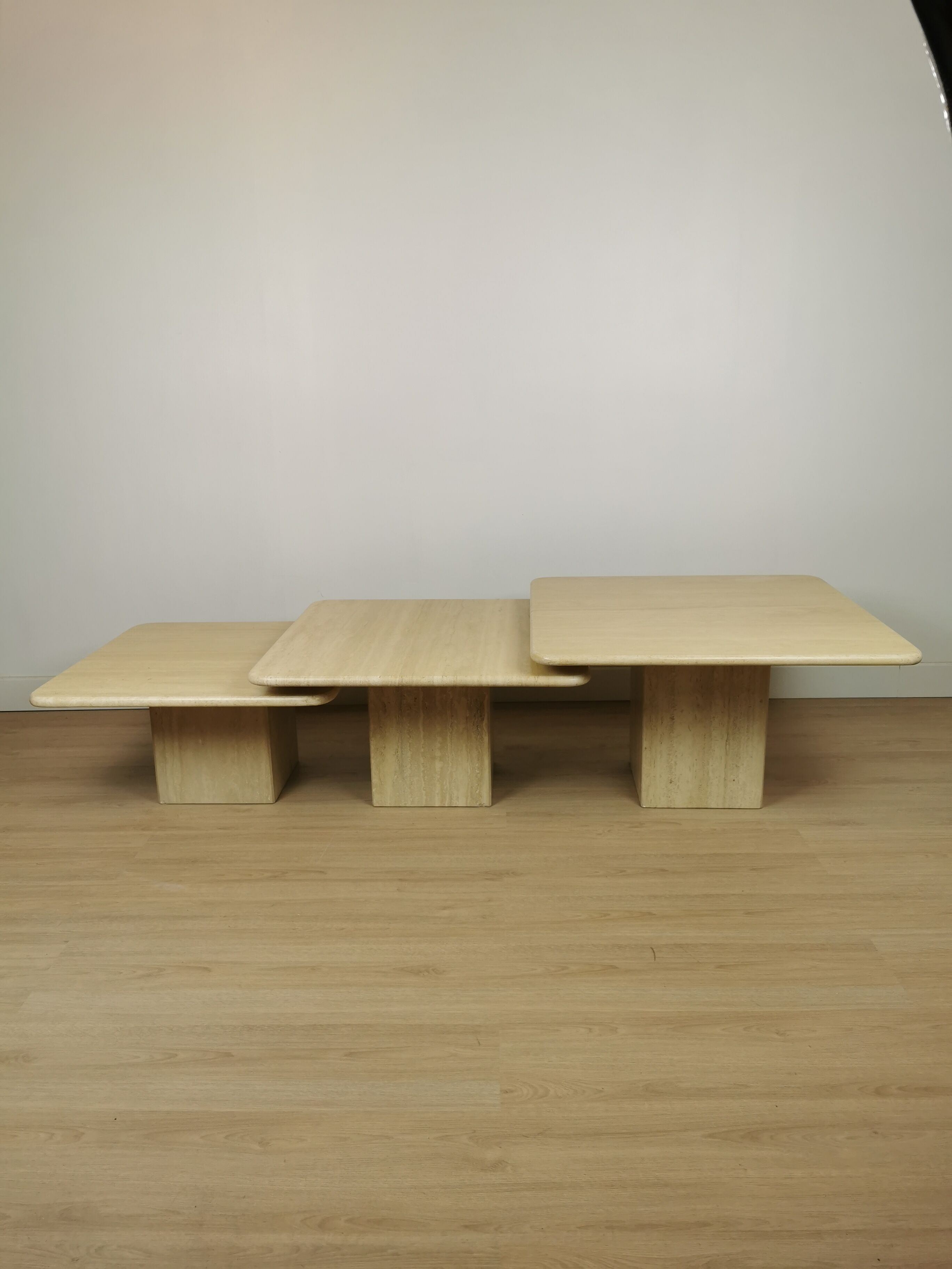 Side tables in travertine 70s