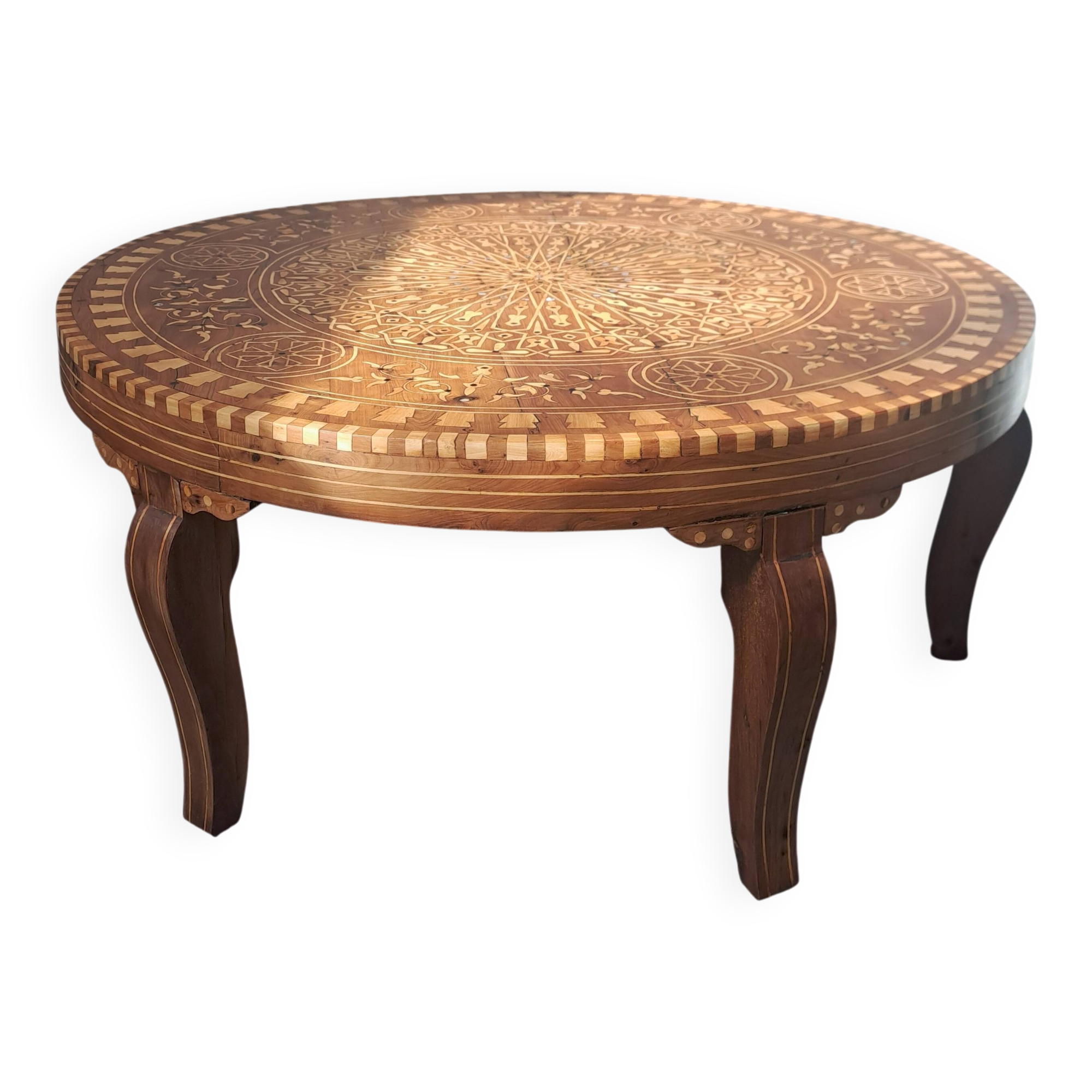 Handcrafted round coffee table of Essaouira type made of thuya wood, with inlays.