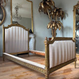 Pair of late 19th-century gilded wooden beds in Louis XVI style.
