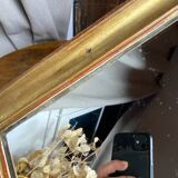 Antique mirror in gilded wood