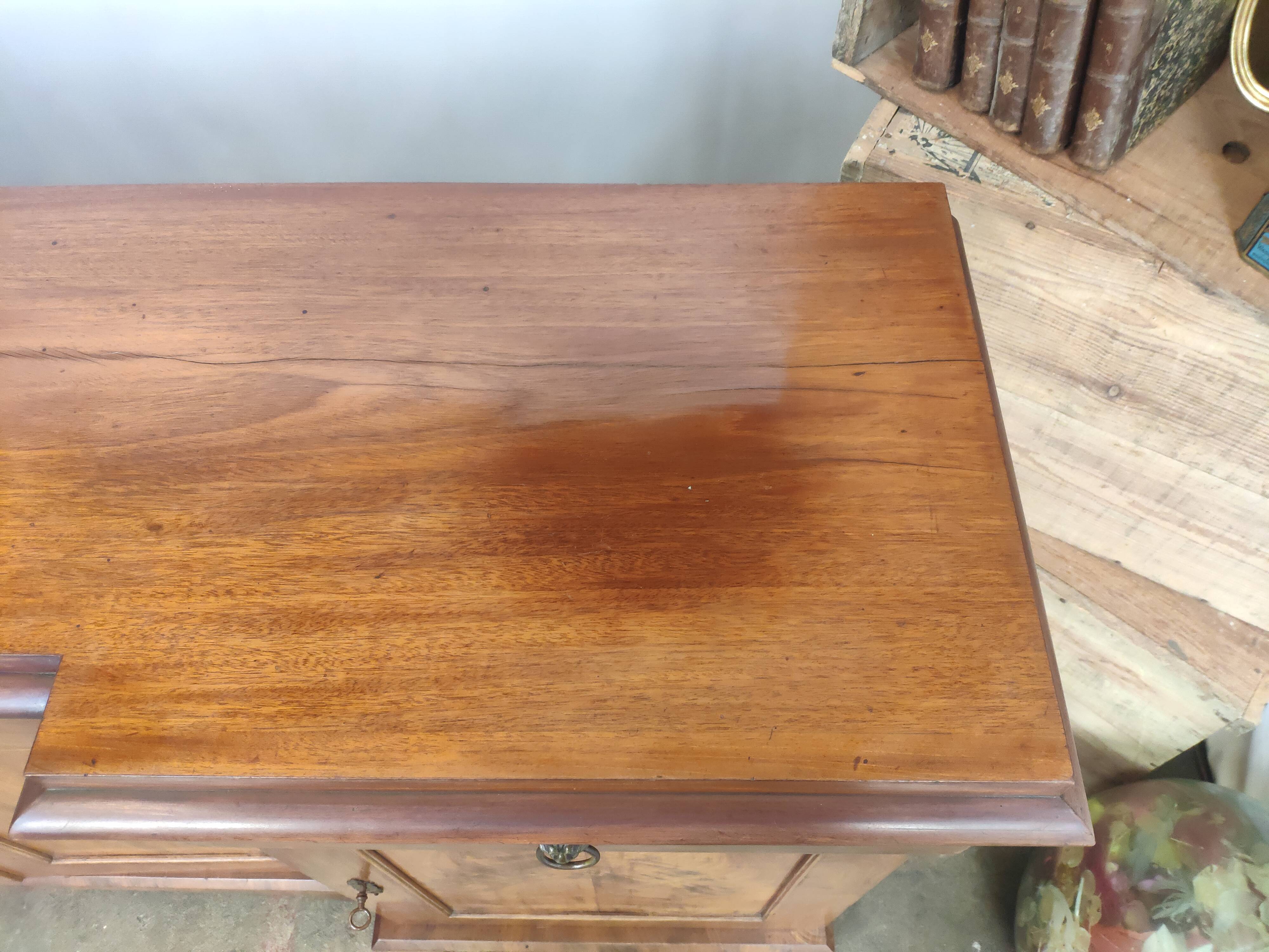 Walnut 4-door lion head sideboard