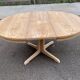 Scandinavian Baumann round extendable dining table with central leg, 115cm.