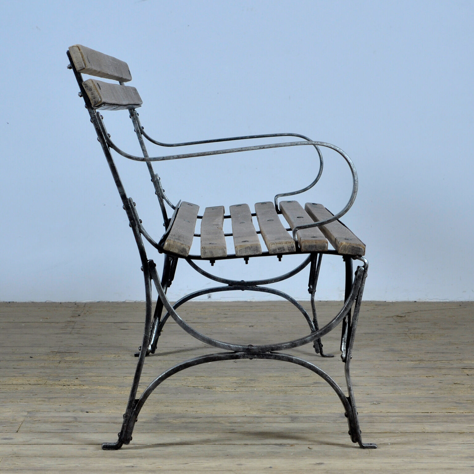 Riveted iron park bench 1920s