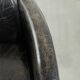 Black vintage cowhide aviator design armchair with characterful appearance