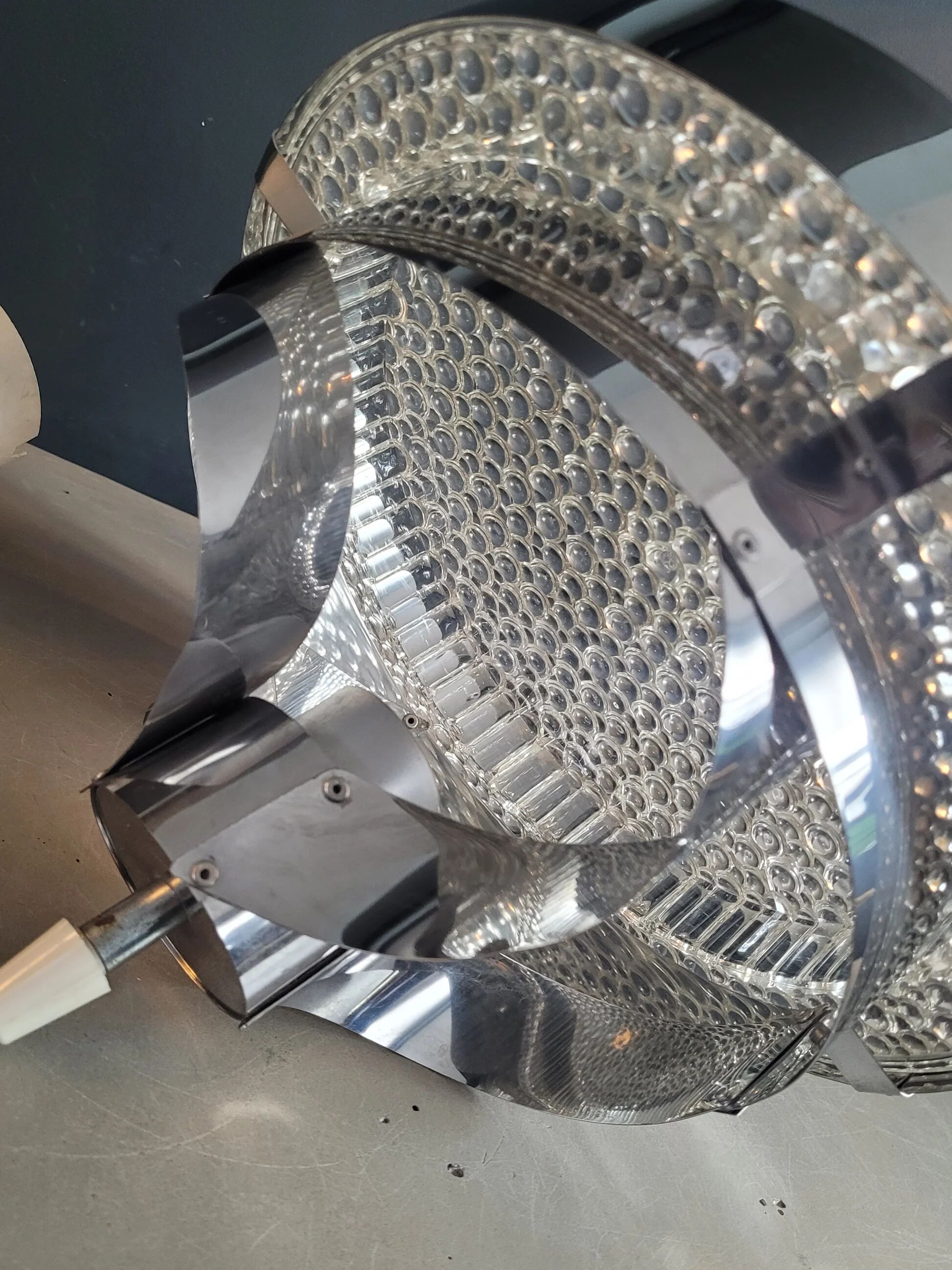 Suspension space-age in plastic bubble and aluminium