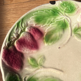Plate in slip decoration strawberries and leaves