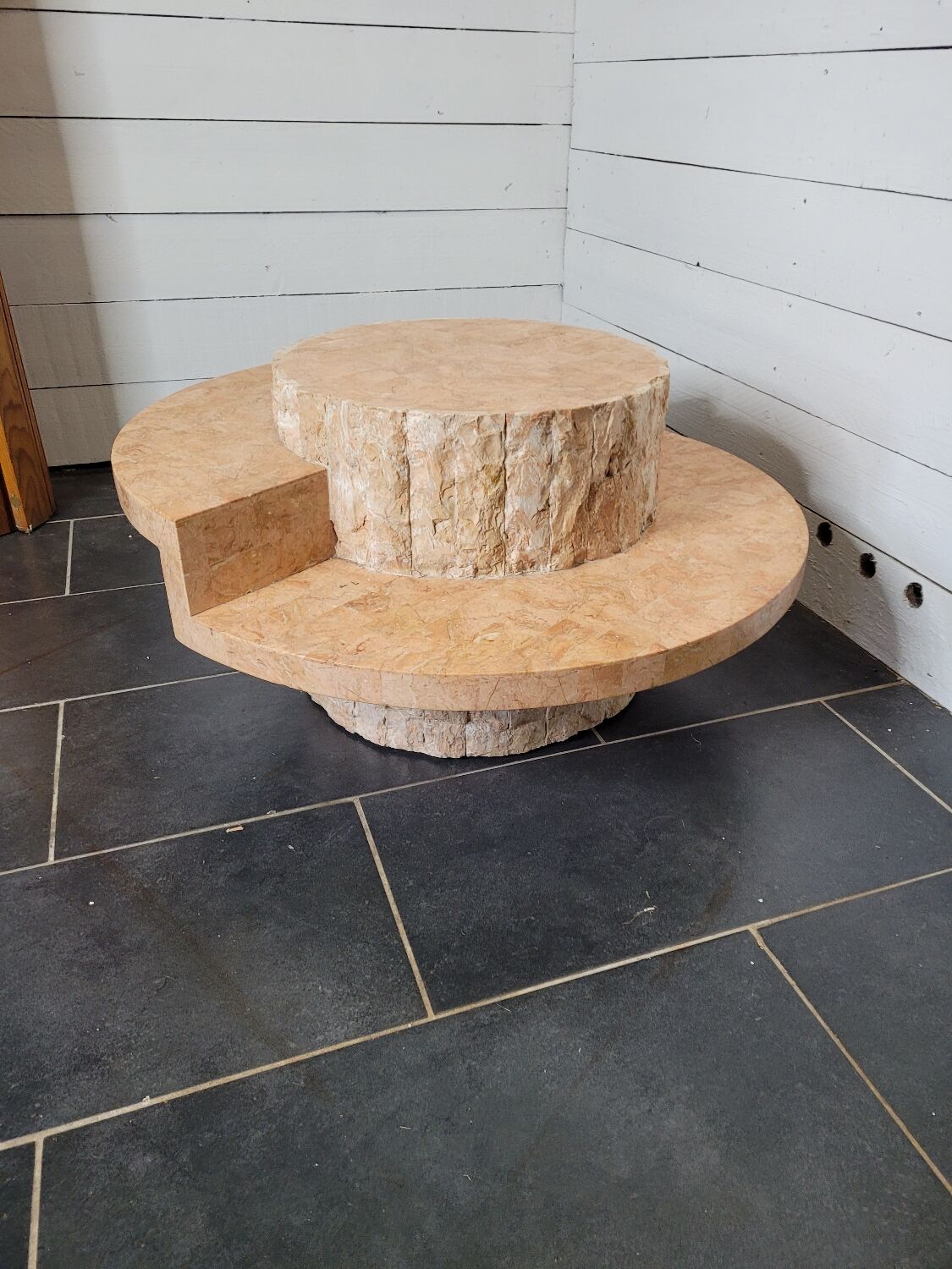 Round stone coffee table by Magnussen Ponte