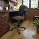 Brown vintage office chair from the 70s on wheels.