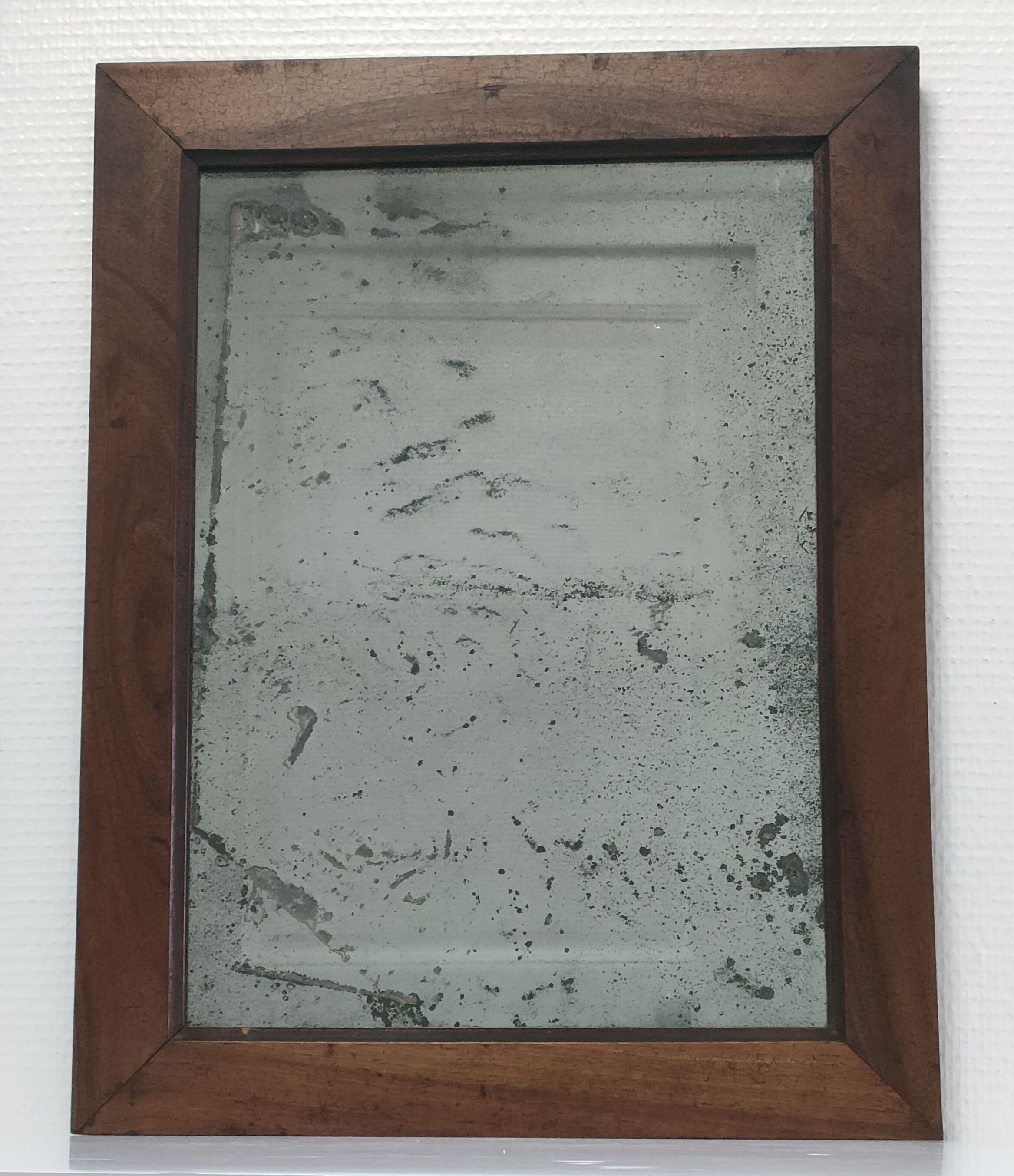 Solid wood mirror and patinated ice early twentieth century