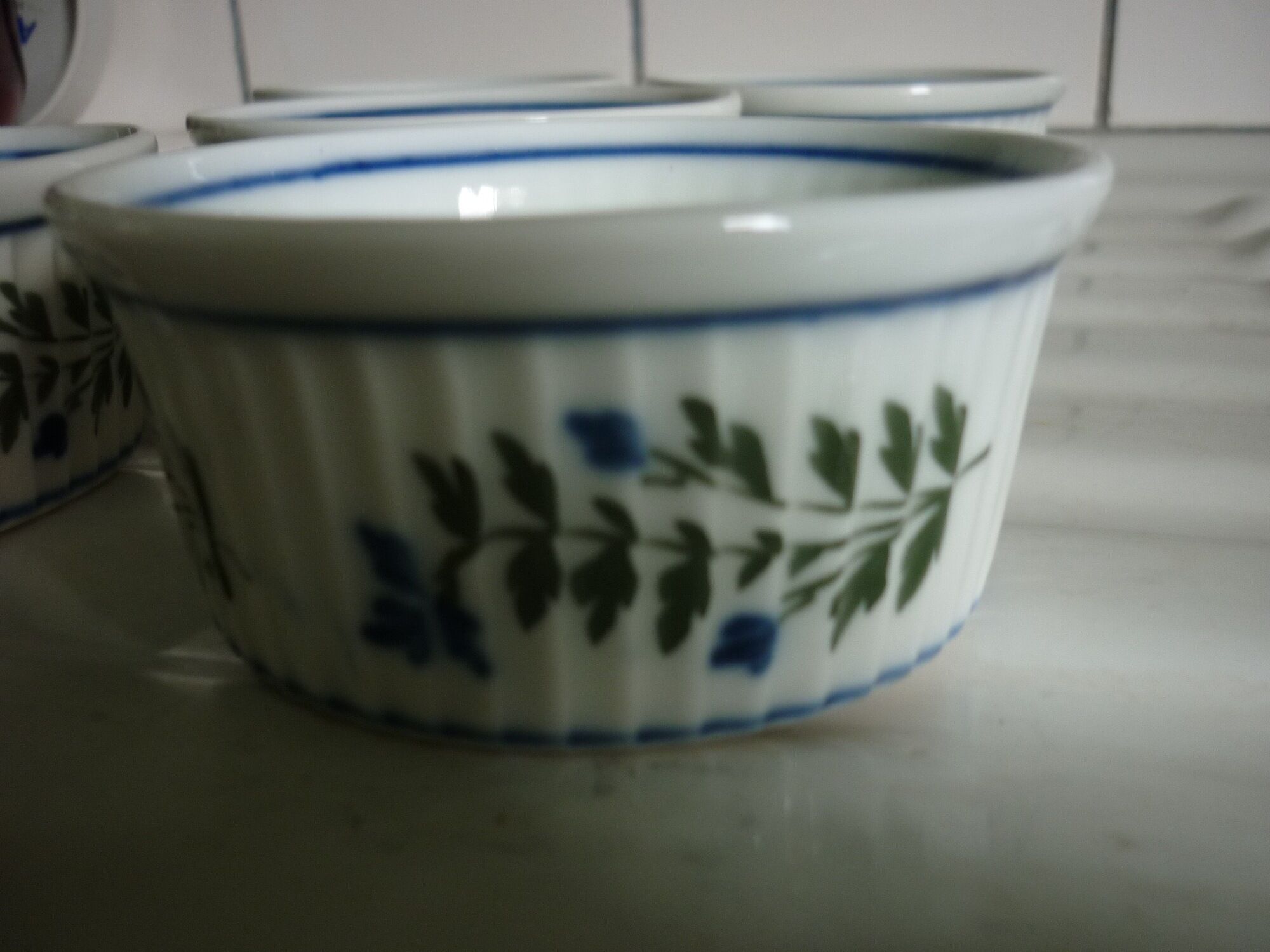 5 porcelain ramekins with smoother decoration and blue flowers and foliage