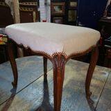 Small Louis XV style bench with curved cabriole legs.