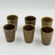 Set of six vintage Digoin stoneware cups.