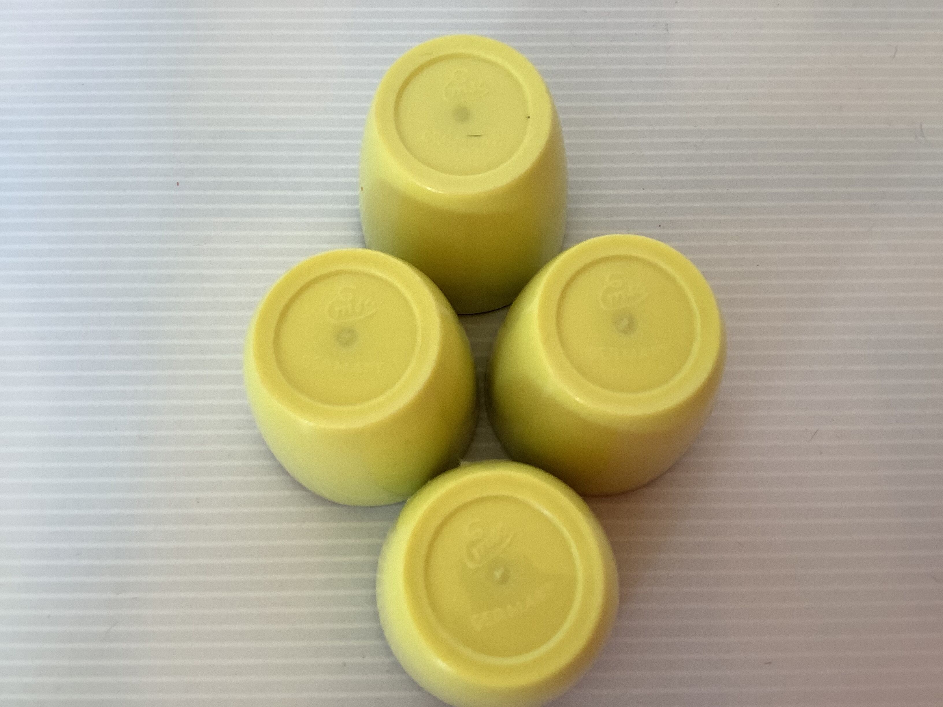 4 old eggcups yellow and black Emsa