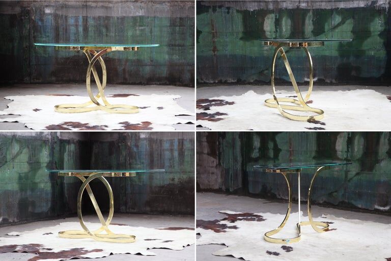 Brass ribbon console table Design Institute of America