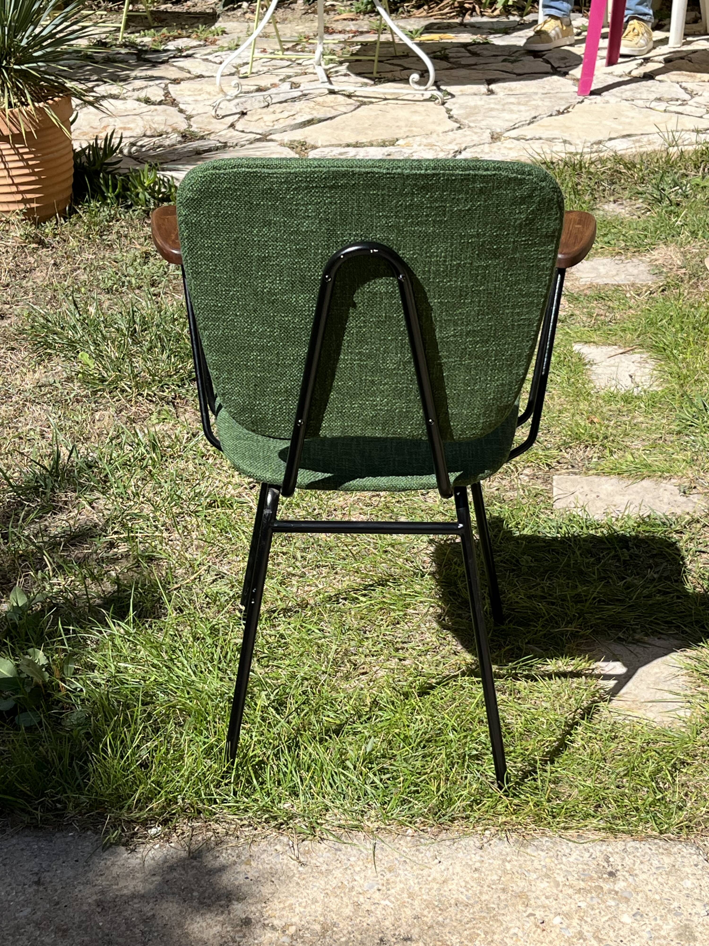 50s chair with armrests.