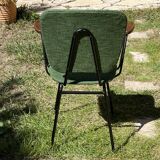 50s chair with armrests.
