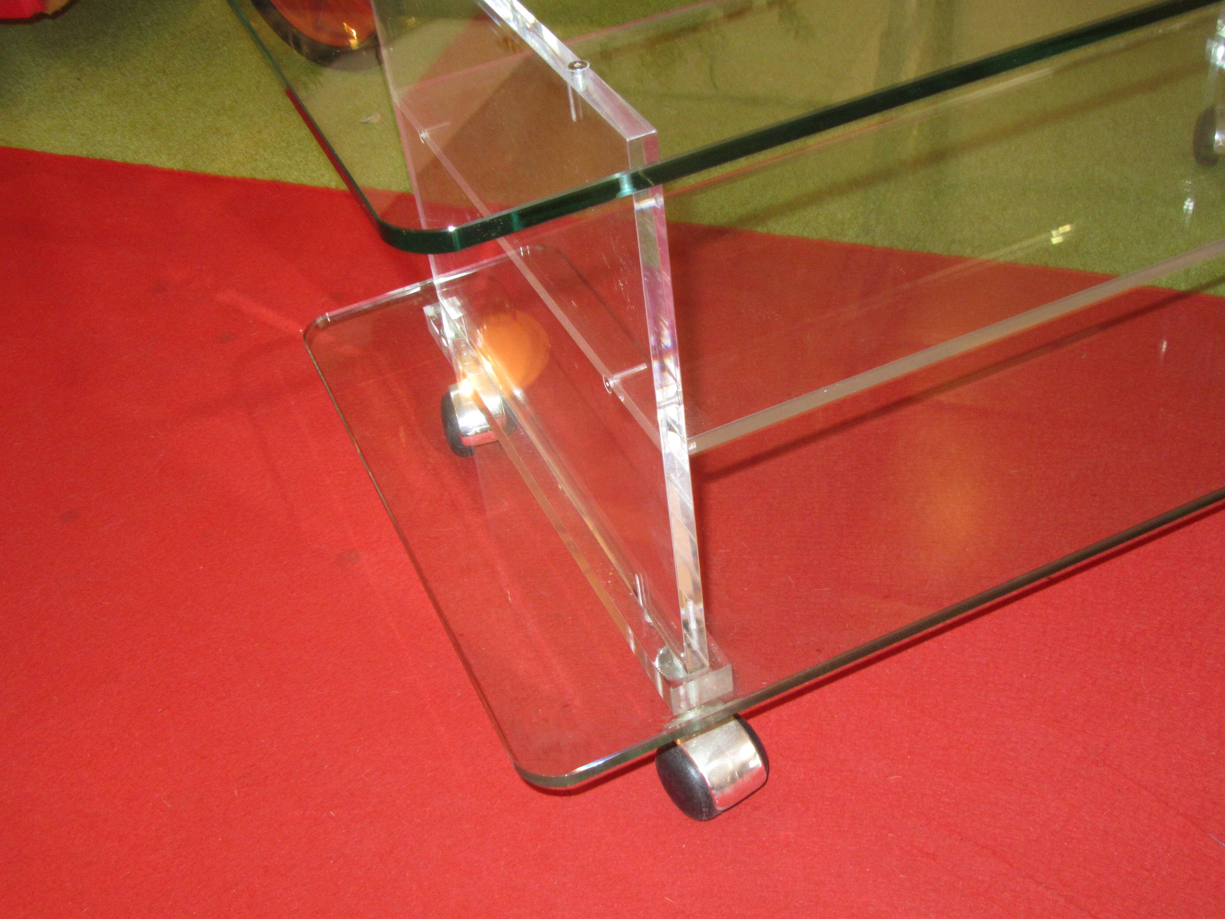 vintage glass coffee table with plexiglass legs
