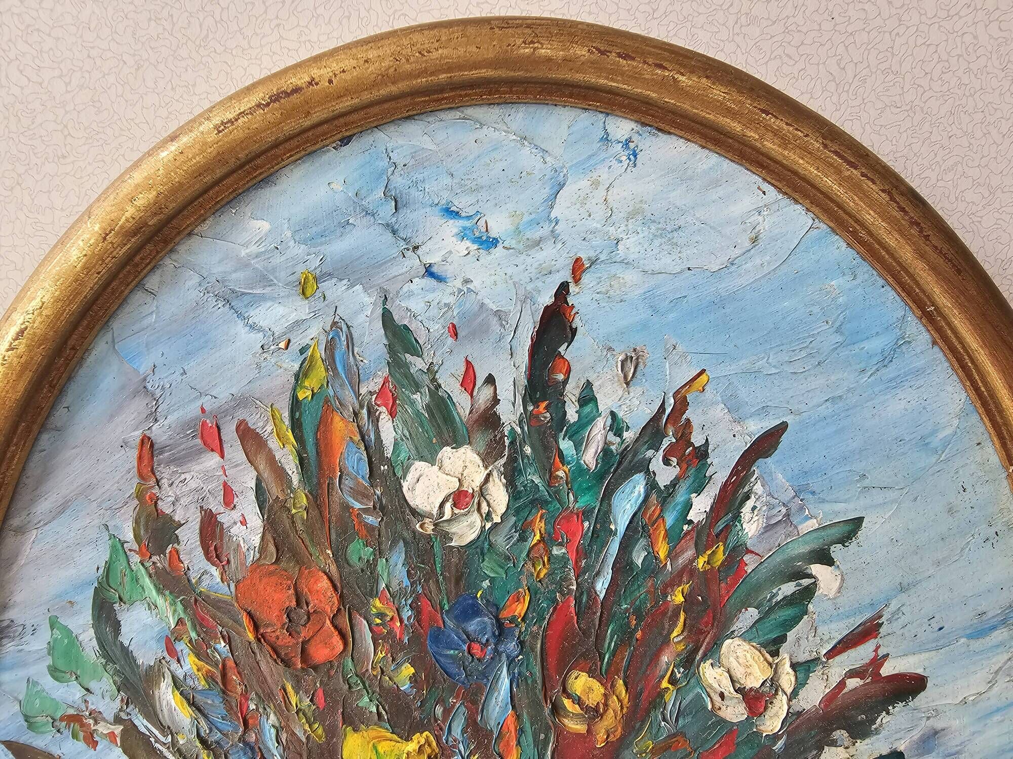 Oil painting on panel of a bouquet of colourful flowers in a vase, signed Valota.