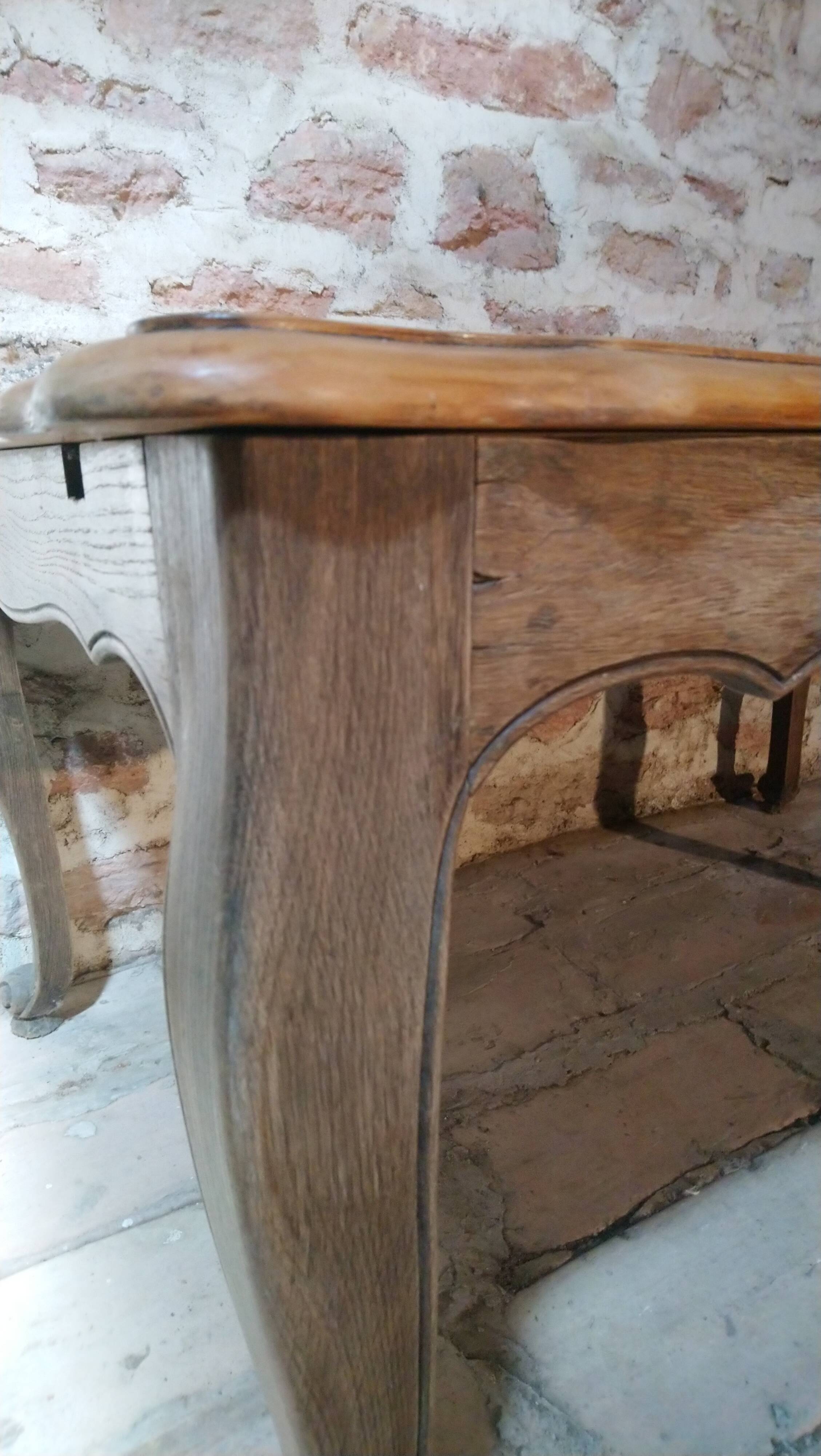 Louis XV style table in oak and cherry wood.