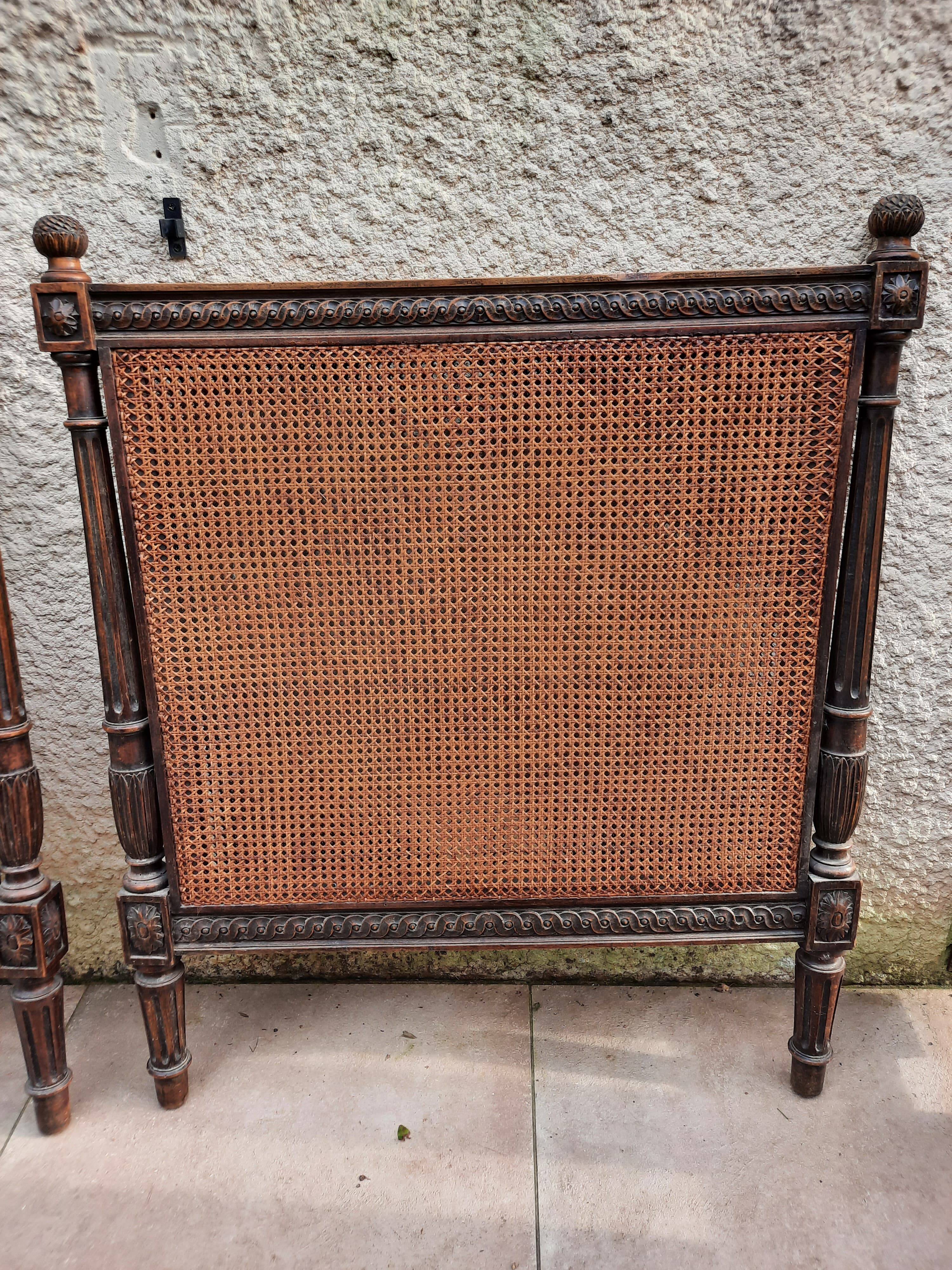 Hand-carved Louis XVI style headboards with chic vintage caning (1800s)