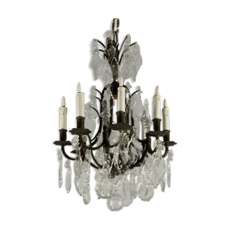 Bronze chandelier trimmed with cut crystal stamps