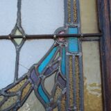 porte en chêne avec des vitraux