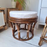 Rattan and boucle fabric pouf