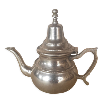 Oriental teapot silver metal