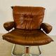 Vintage mid-century Scandinavian cognac leather lounge chair by Harald Relling