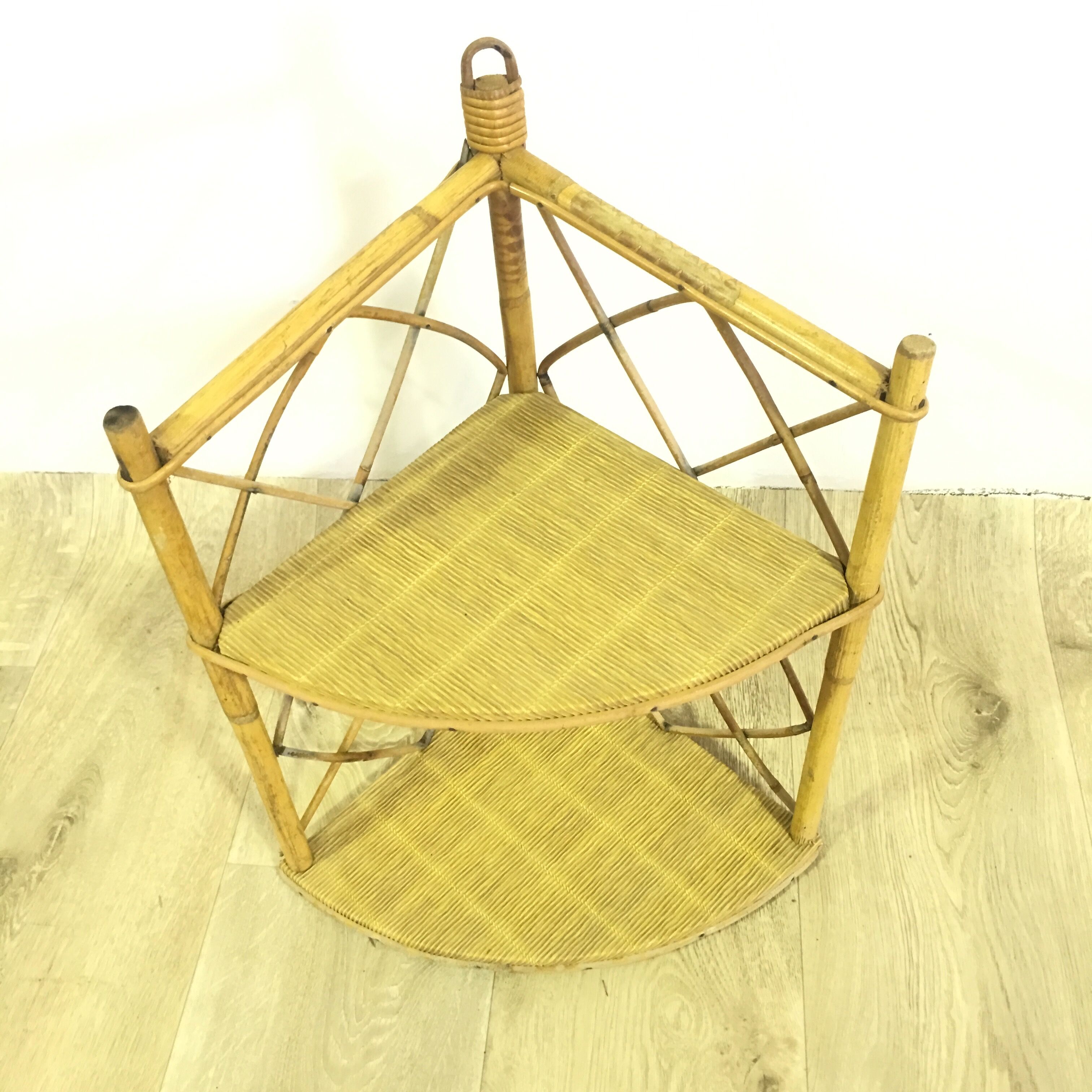 Corner wicker shelf