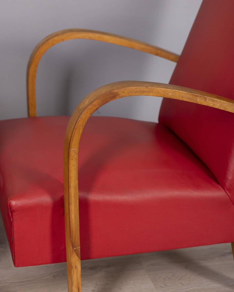 Pair of vintage 1950's armchairs in red leather, italian design