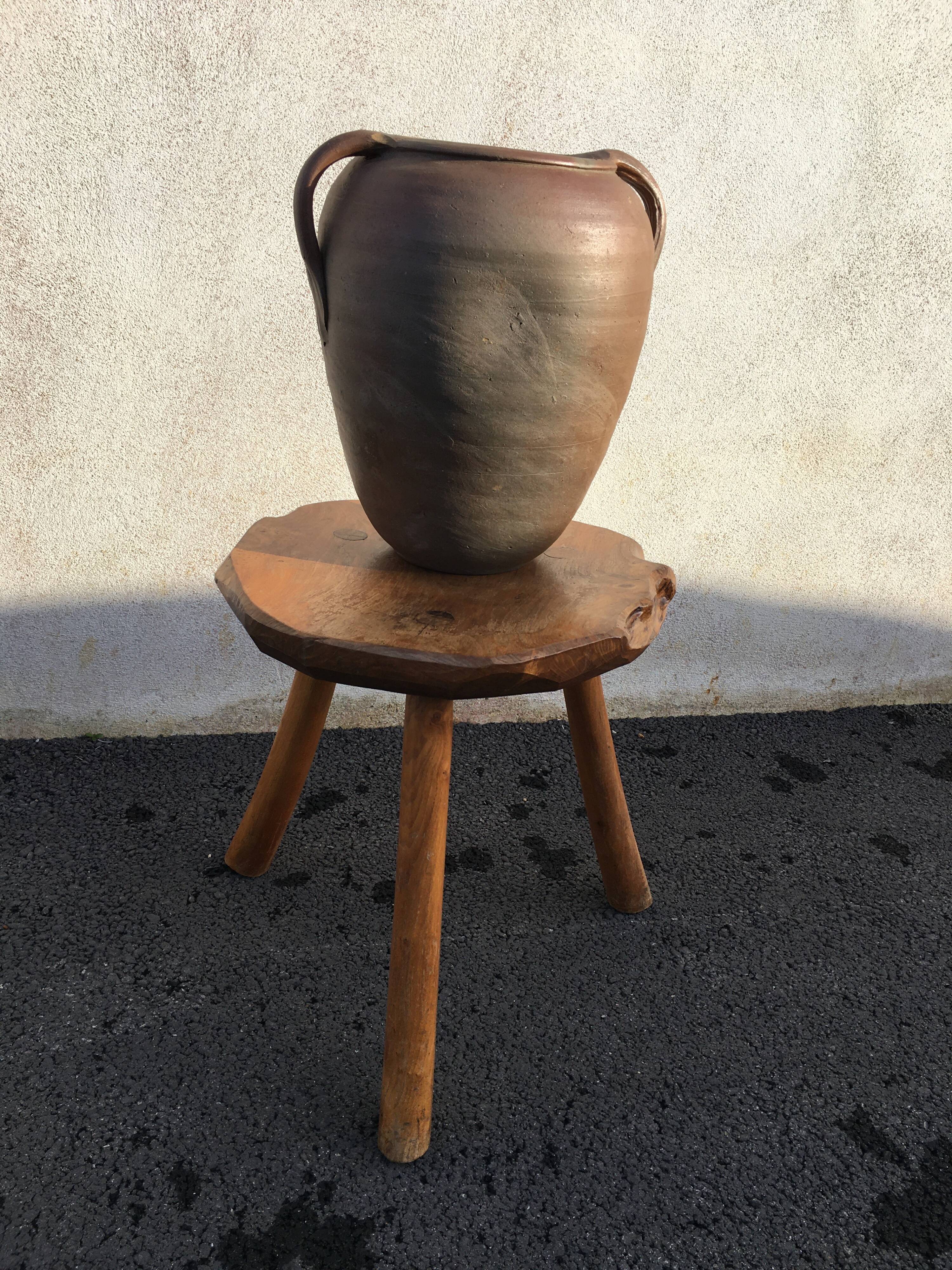Old jug with two sandstone handles