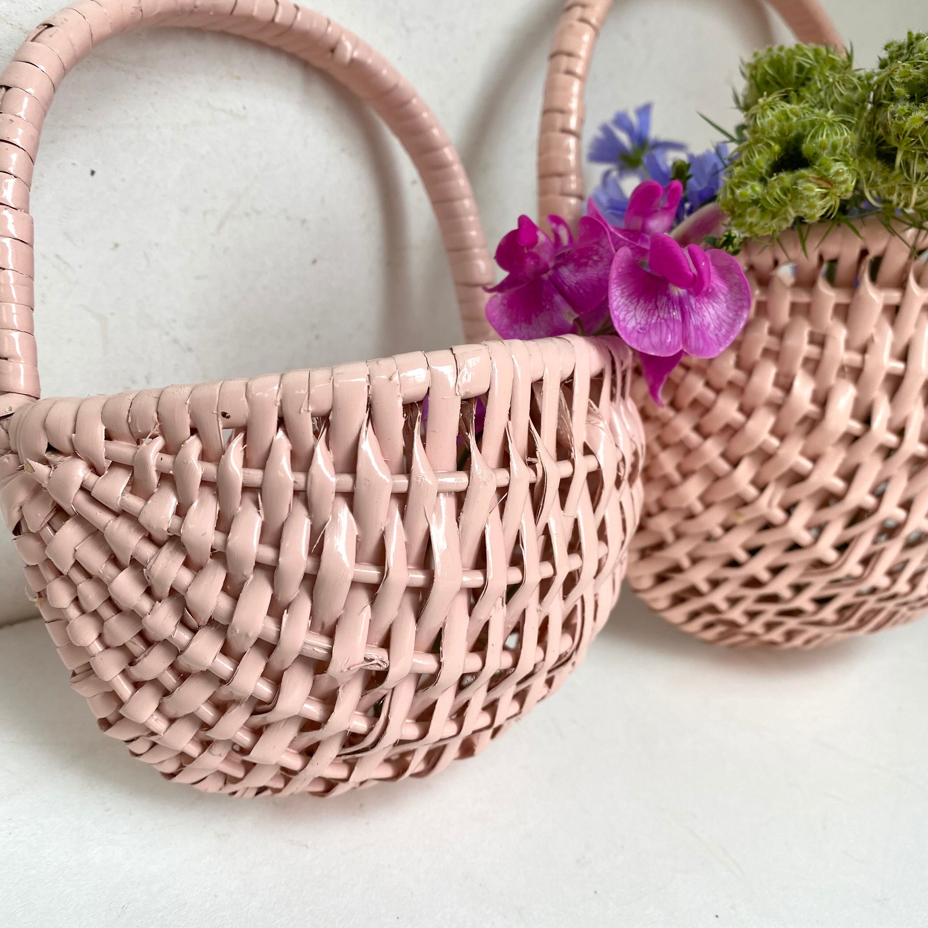 Vintage wall pans in woven wicker
