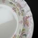 Antique Longchamp service shallow dish with polychrome daisies, ironstone, 19th century.