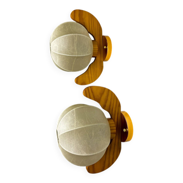 Pair of Italian "Cocoon" wall lights, resin and pine wood, circa 1970