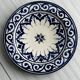 Raised dish, ceramic plate with blue and white patterns.