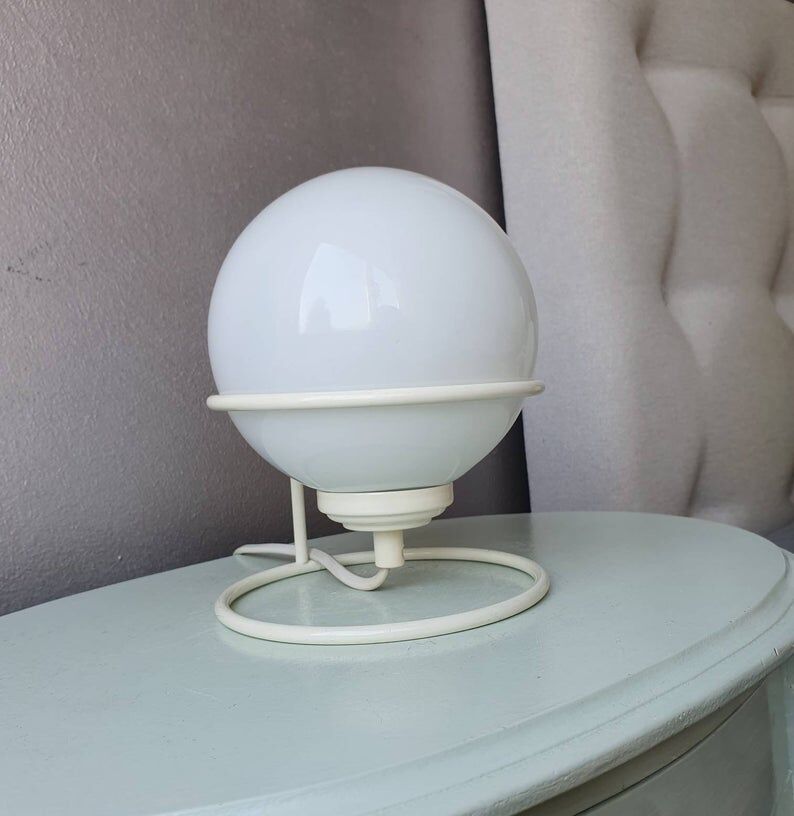 Vintage light bulb lamp on metal support 1980