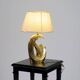 Living room lamp in golden brass