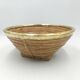 Rattan and brass basket