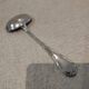 Silver-plated sauce spoon by Christofle silversmiths, Louis XVI ribbons