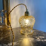 Baladeuse avec globe vintage en verre ambré