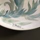 Signed floral decoration plate