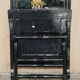 Pair of military folding chairs with Indian decoration.