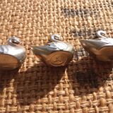 5 vintage swan knife holders. silver plated