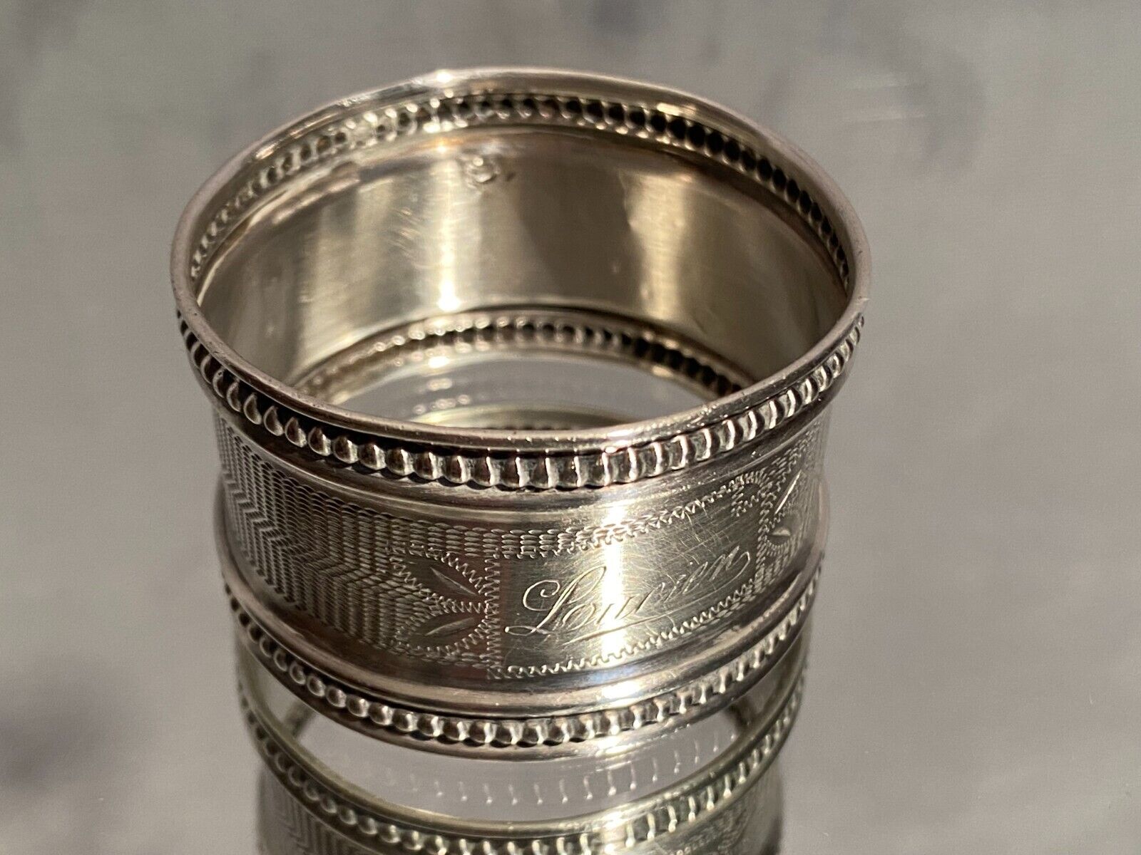 Solid silver napkin ring Minerva with Louis XVI style guilloché decoration
