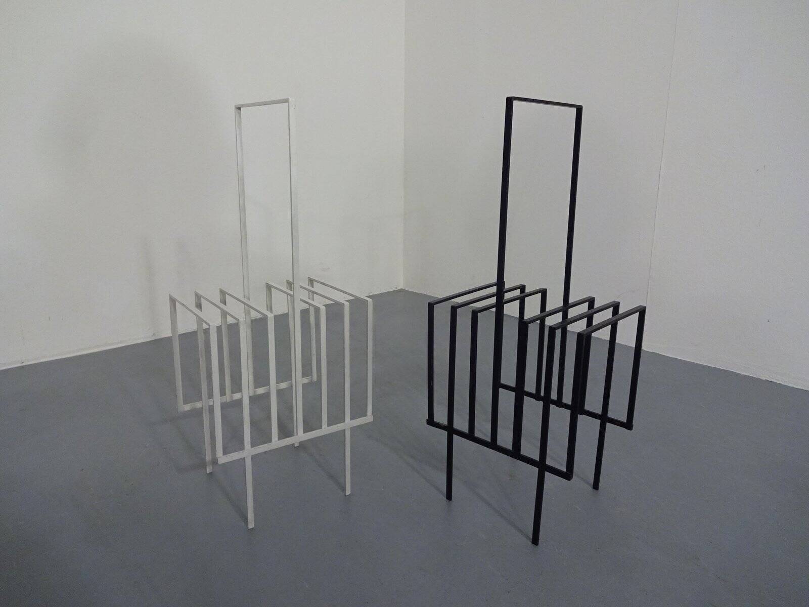 Steel magazine or record racks, 1960s, set of 2