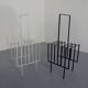 Steel magazine or record racks, 1960s, set of 2