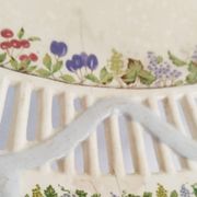 Oval dish in openwork earthenware from Sarreguemines, blue ribbon and fruit